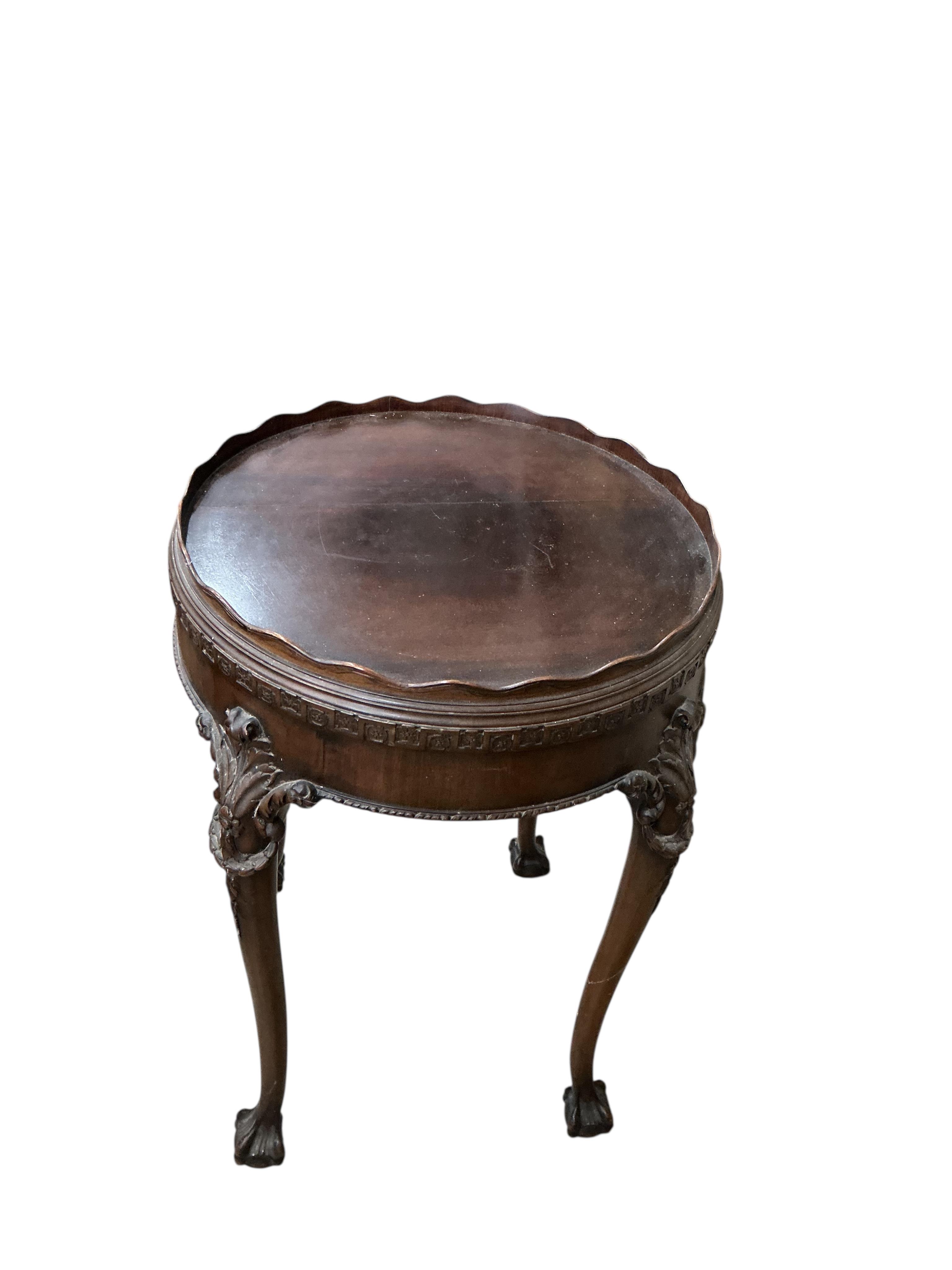An early 20th century George III style circular mahogany centre table, diameter 52cm, height 79cm